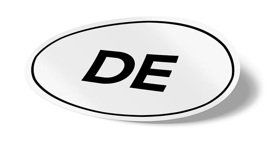 DE.design Logo: weißer, ovaler Länderkürzel-Aufkleber mit DE in der Mitte | white, oval country code sticker with DE in the middle